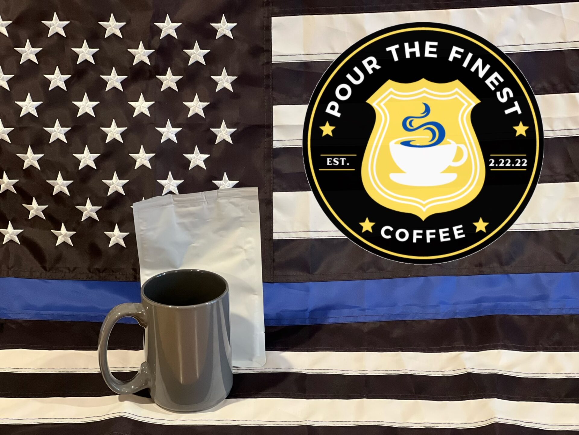 Coffee mug and a logo on a flag